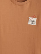 Solid Oversized T-Shirt With Printed Canvas Patch And Raw Edge Detail | Brown